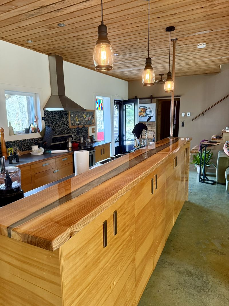 Live-edge solid-wood kitchen island counter, made from a recovered tree — Ultra Tree × Vallières Atelier